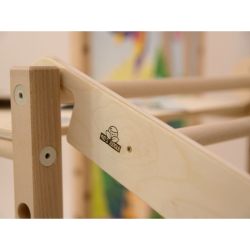 Large Montessori playground with wooden and rope ladder